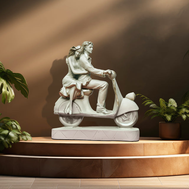 Romantic Couple on Scooter Statue